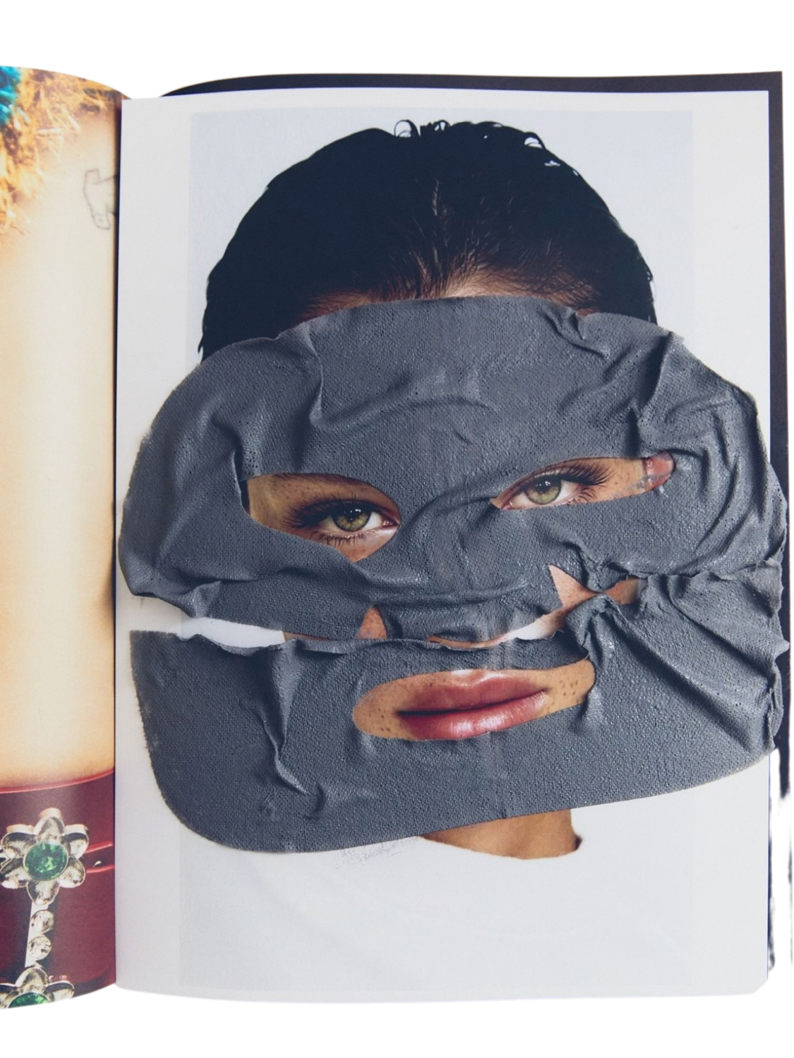 Sheet mask on a face, from a magazine spread